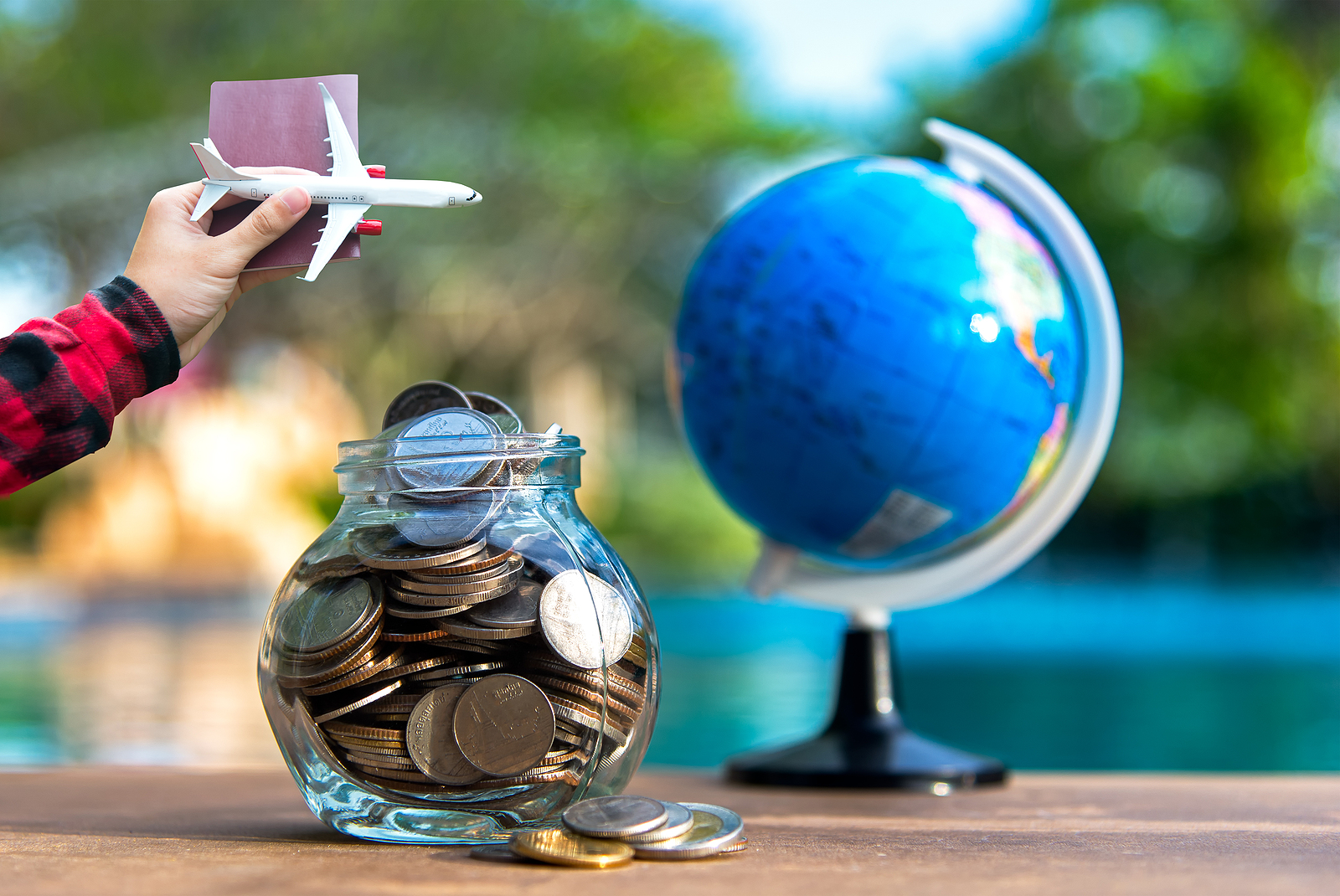 Wessex Healthcare supplies quality mobility products and independent living aids to the less abled and disabled Travel money savings in a glass jar