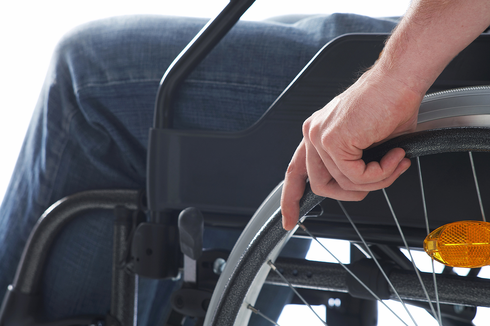 Wessex Healthcare supplies quality mobility products and independent living aids to the less abled and disabled 24 wide wheelchair - man sitting on a wheelchair
