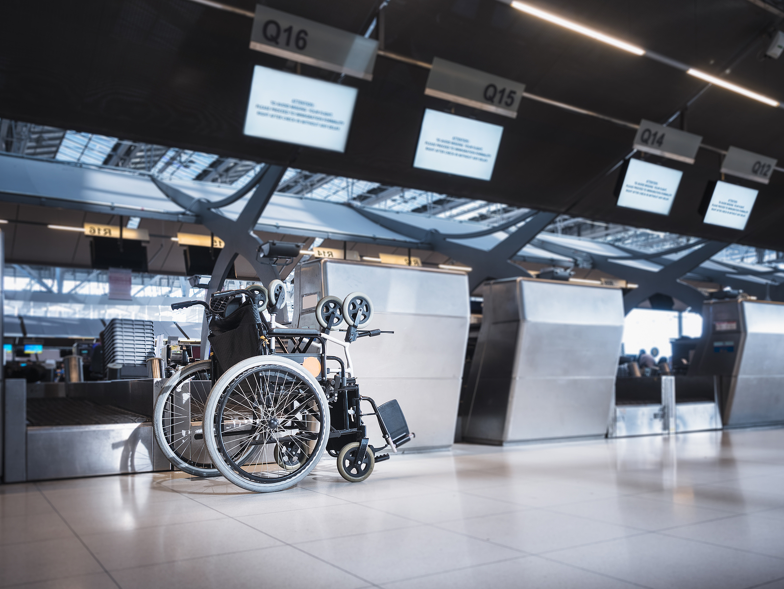 Wessex Healthcare supplies quality mobility products and independent living aids to the less abled and disabled quickie q50 r carbon folding powerchair - disability passenger at Airport